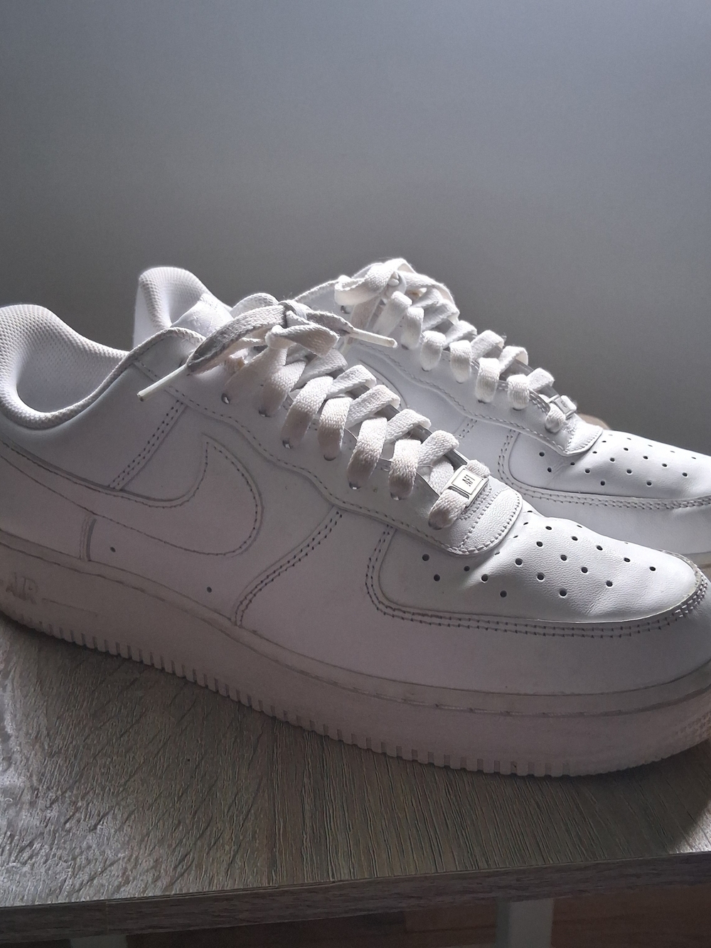 NIKE Air Force Ones Classic All-White Low Top Sneakers